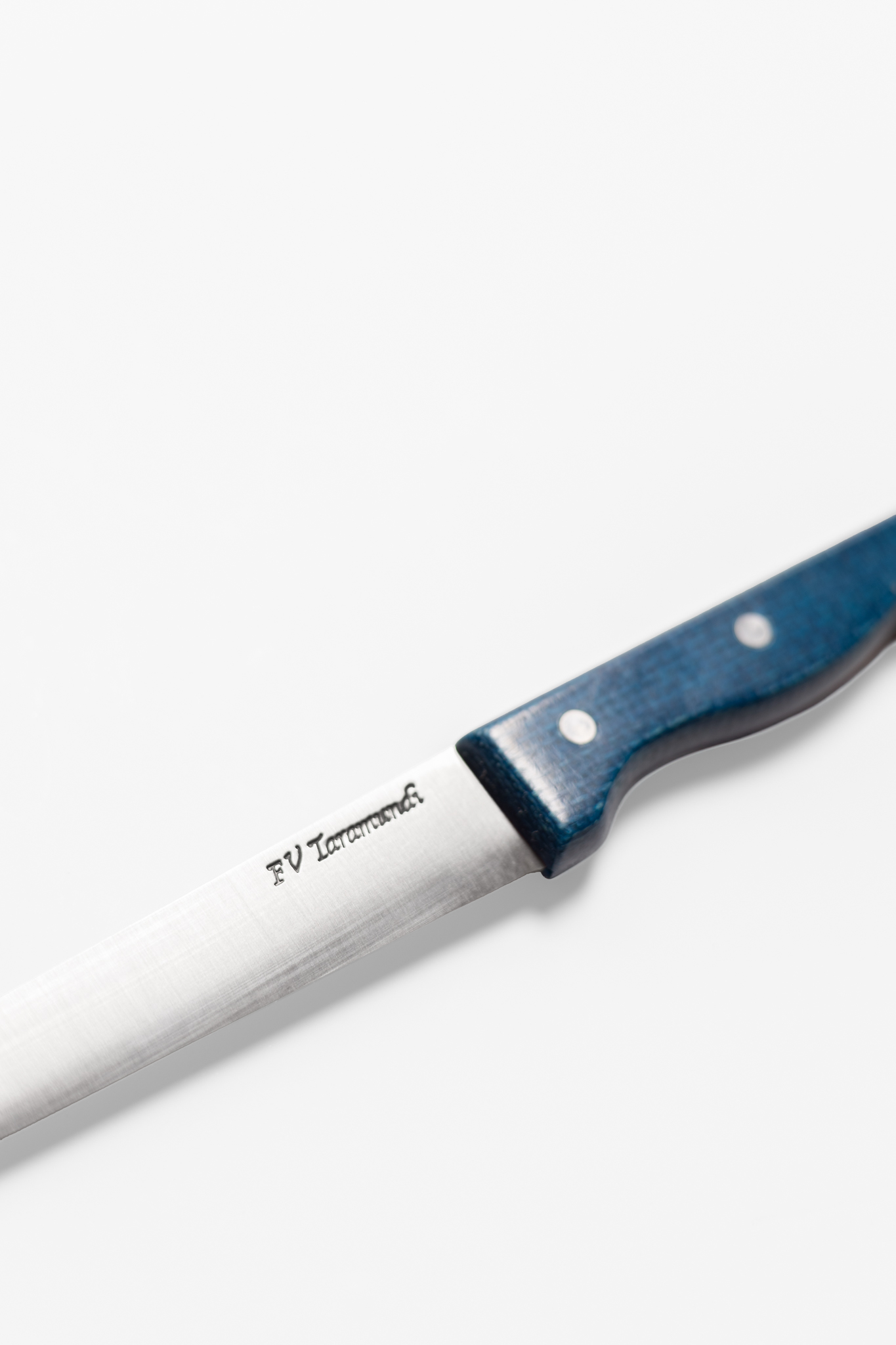 Detalle marca FV cuchillo yute azul
